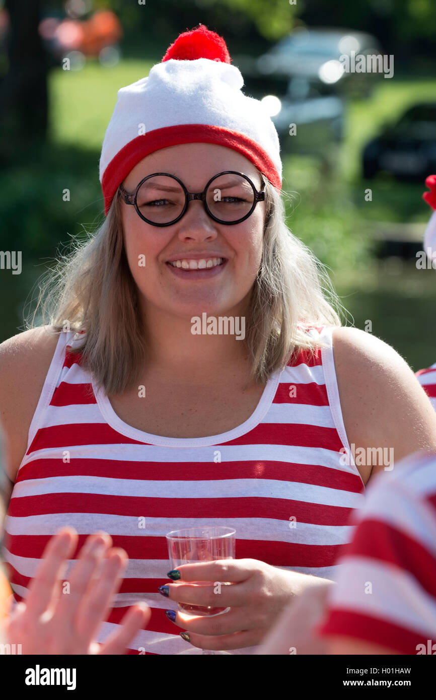 Dragon boat racing, a member of a team wearing Where`s Wally fancy